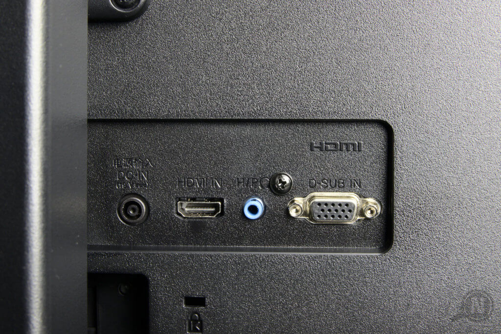 Teil der RĂŒckseite eines Bildschirms mit AnschlĂŒssen: Netzteil, HDMI, Kopfhörer und VGA